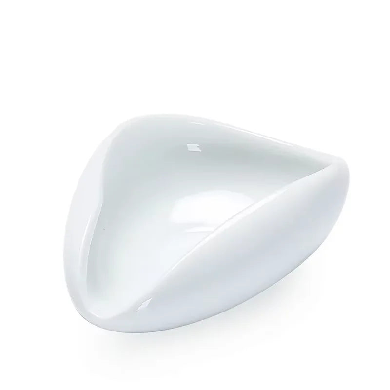 White ceramic coffee dosing funnel on a white background, barista accessory