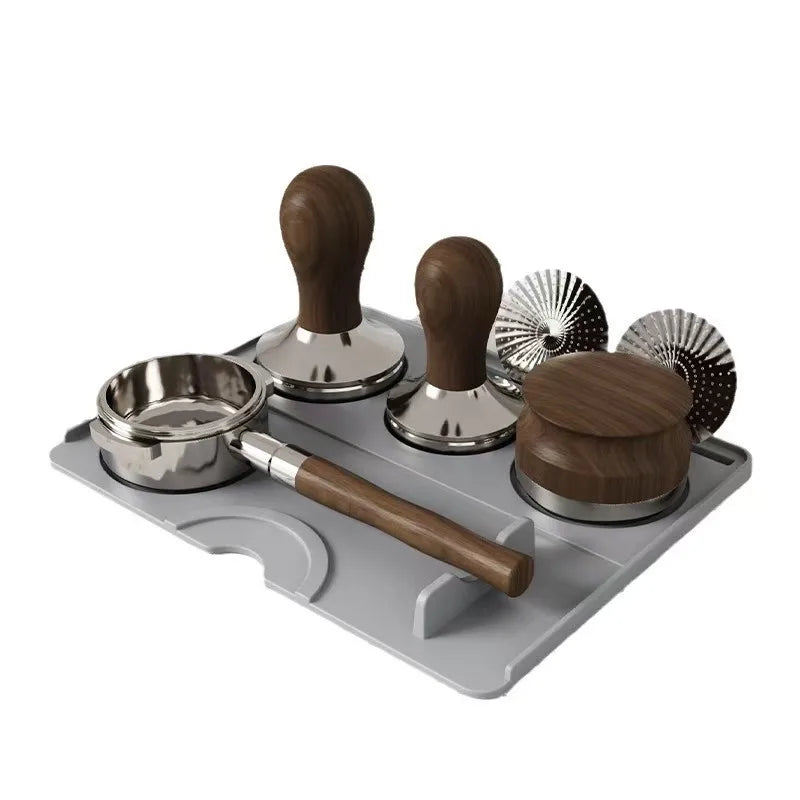 Espresso tamper set with wooden handles, dosing ring, puck screens, and portafilter on tray