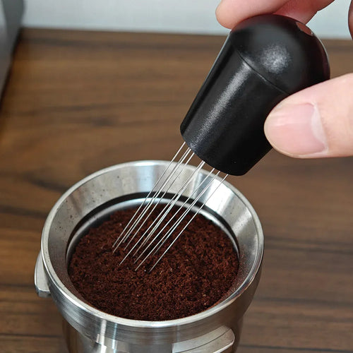 Espresso distribution tool leveling ground coffee in a portafilter, home barista accessory