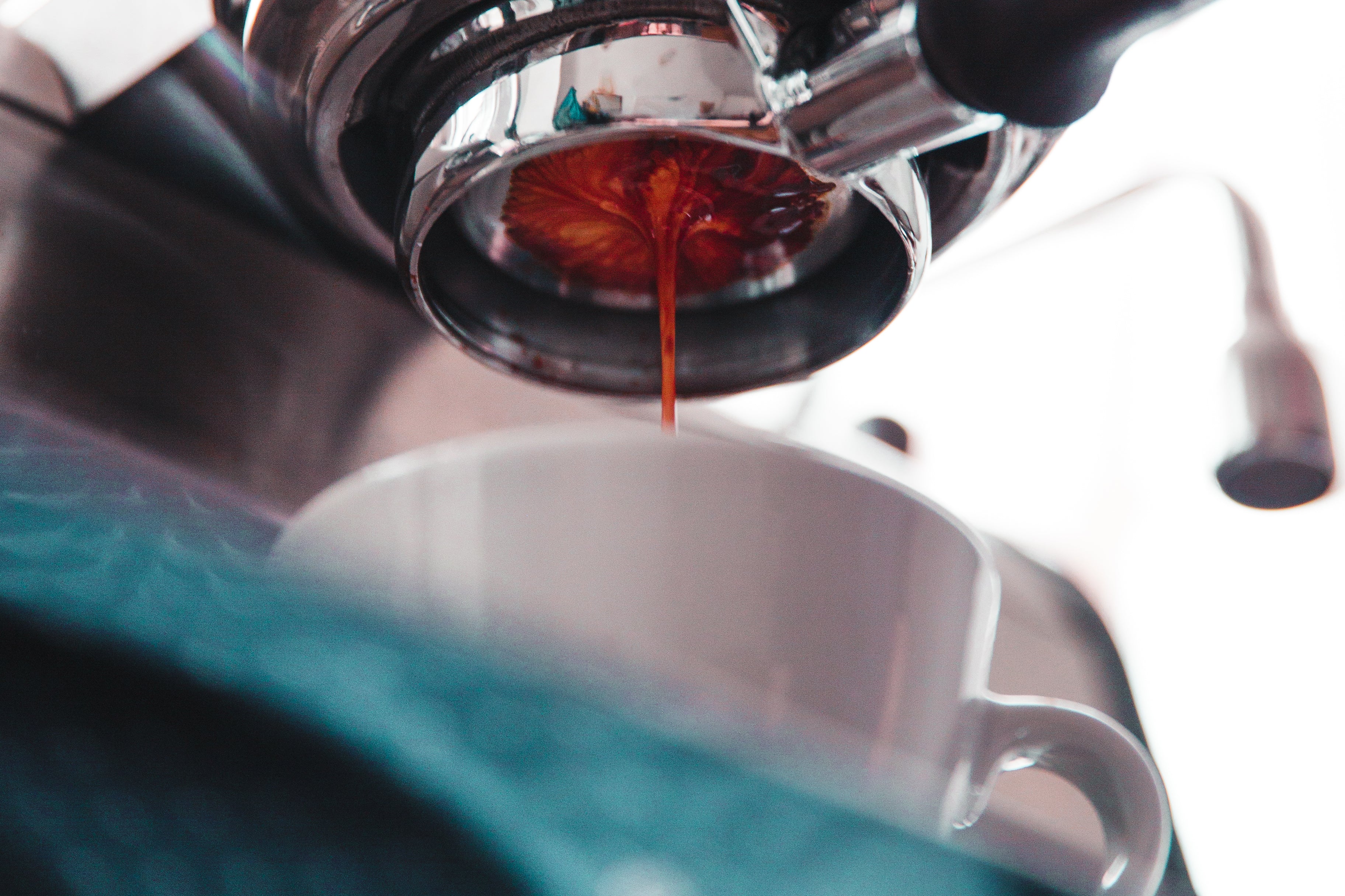 close-up-on-espresso-machine-pull - ZYVRO